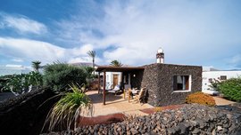 Die Casita Coral bestehend aus den Lavasteinen Lanzarotes Die Casita Coral bestehend aus den Lavasteinen Lanzarotes
