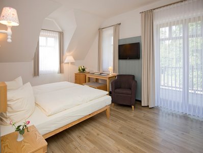Gerade Linien und viel Naturholz in den Zimmern des Okelmann's