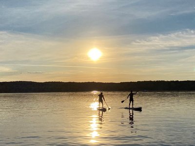 Den Tag mit Stand Up Paddeling ausklingen lassen