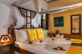 Das gemütliche Bett im Coconut Doppelzimmer Das gemütliche Bett im Coconut Doppelzimmer