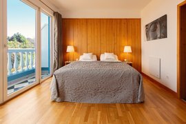 Das gemütliche Bett im Casita Ayurveda lädt zum Erholen ein