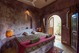 Im Yoga Urlaub empfängt Sie das Raj Luxury Zimmer Jaipur mit Wohlfühlfarben Im Yoga Urlaub empfängt Sie das Raj Luxury Zimmer Jaipur mit Wohlfühlfarben