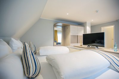 Die Zimmer der Nordsee Lodge sind gemütliche Wohlfühloasen
