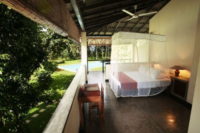 Die Deluxe Rooms liegen quasi mitten in der Natur - hier: Zimmerbeispiel Deluxe Room Upper Floor