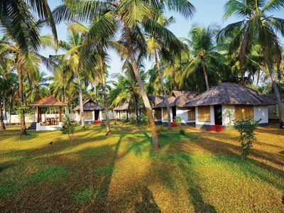 Die großen Zimmer des Meiveda Ayurveda Resort im Schatten der Indischen Sonne