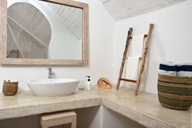 Das Badezimmer im Bungalow mit Meerblick Das Badezimmer im Bungalow mit Meerblick