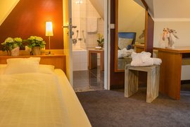 Zimmer der Kategorie Einzelzimmer Zimmer der Kategorie Einzelzimmer