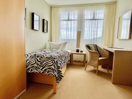 Liebevolle Klarheit in den Einzelzimmern des Hotels Liebevolle Klarheit in den Einzelzimmern des Hotels