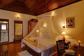 In den Zimmer Somatheeram Ayurveda Beach Resort spüren Sie den Charme der traditionellen Architektur Keralas 
 In den Zimmer Somatheeram Ayurveda Beach Resort spüren Sie den Charme der traditionellen Architektur Keralas